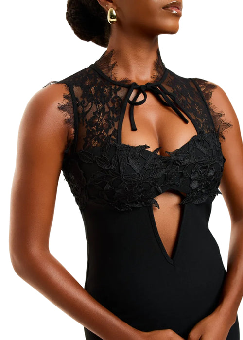 Black lace bodysuit worn by a model on a white background