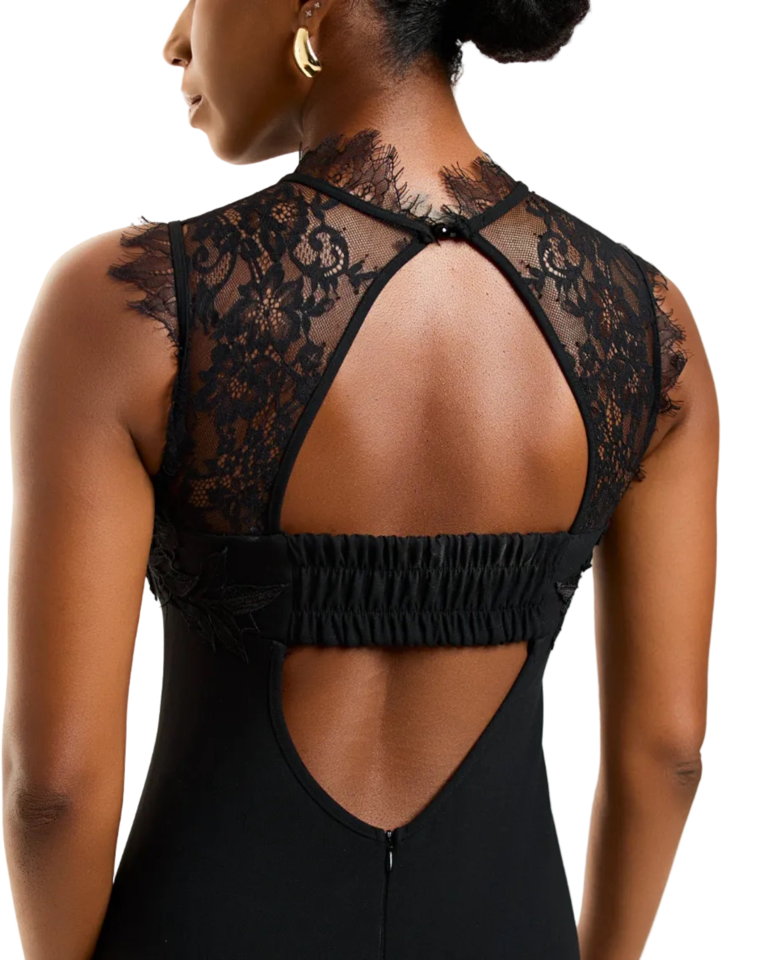 Black lace dress with open back on a model against a white background